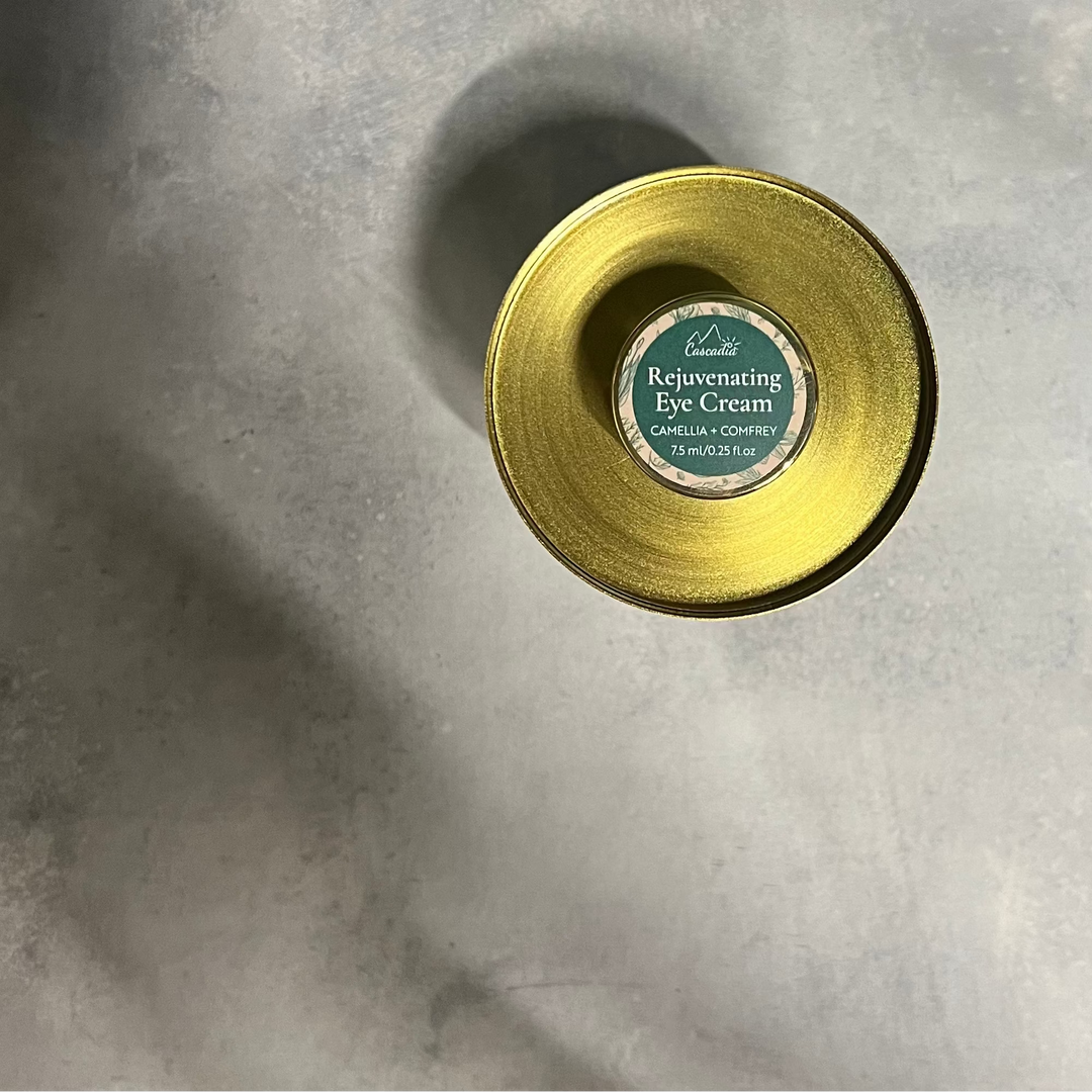 Gold container with a green label on a gold stand